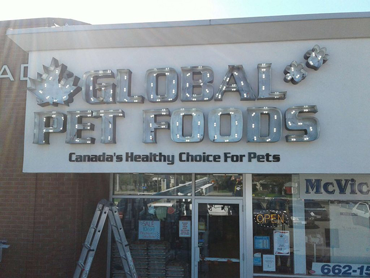 a photo of global pet foods signage